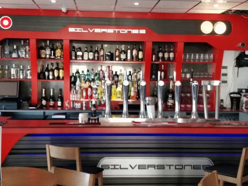 The Silverstones bar counter and back bar, fully stocked with spirits and beer taps